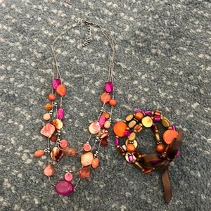 3 stretch bracelets and coordinating 3 strand necklace.